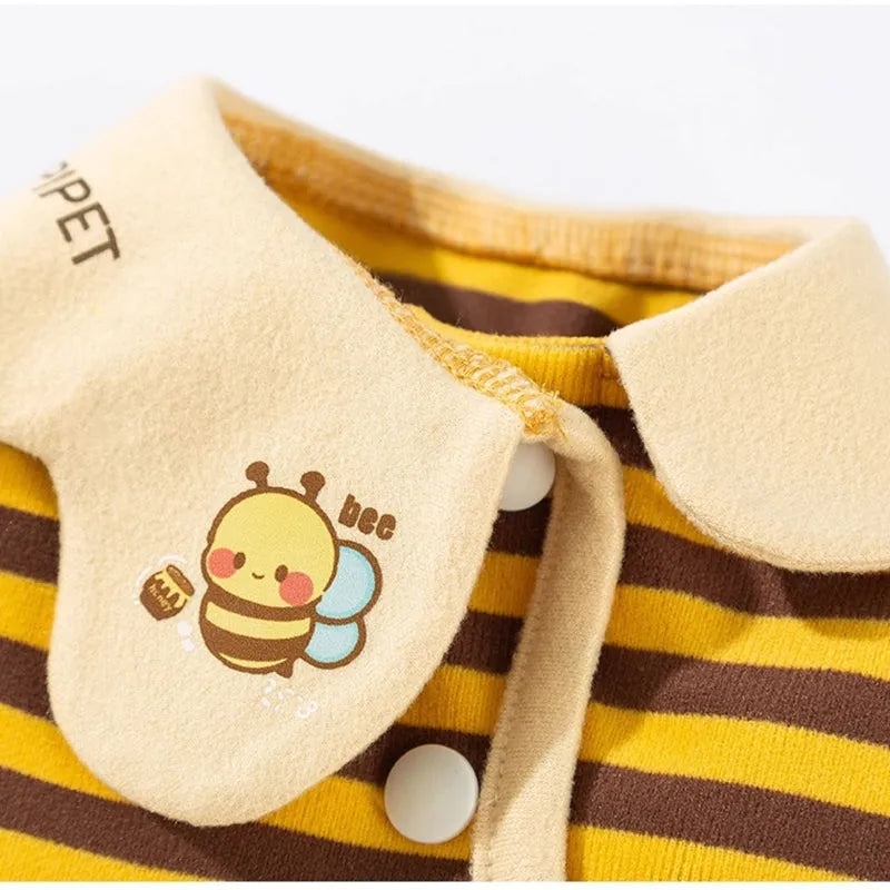 Yellow bee-patterned dog pajamas on small dog, four-legged full coverage suit with lapel collar