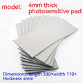 Black and grey plastic photosensitive mat for seal making, shown with dimensions 330mm by 110mm.