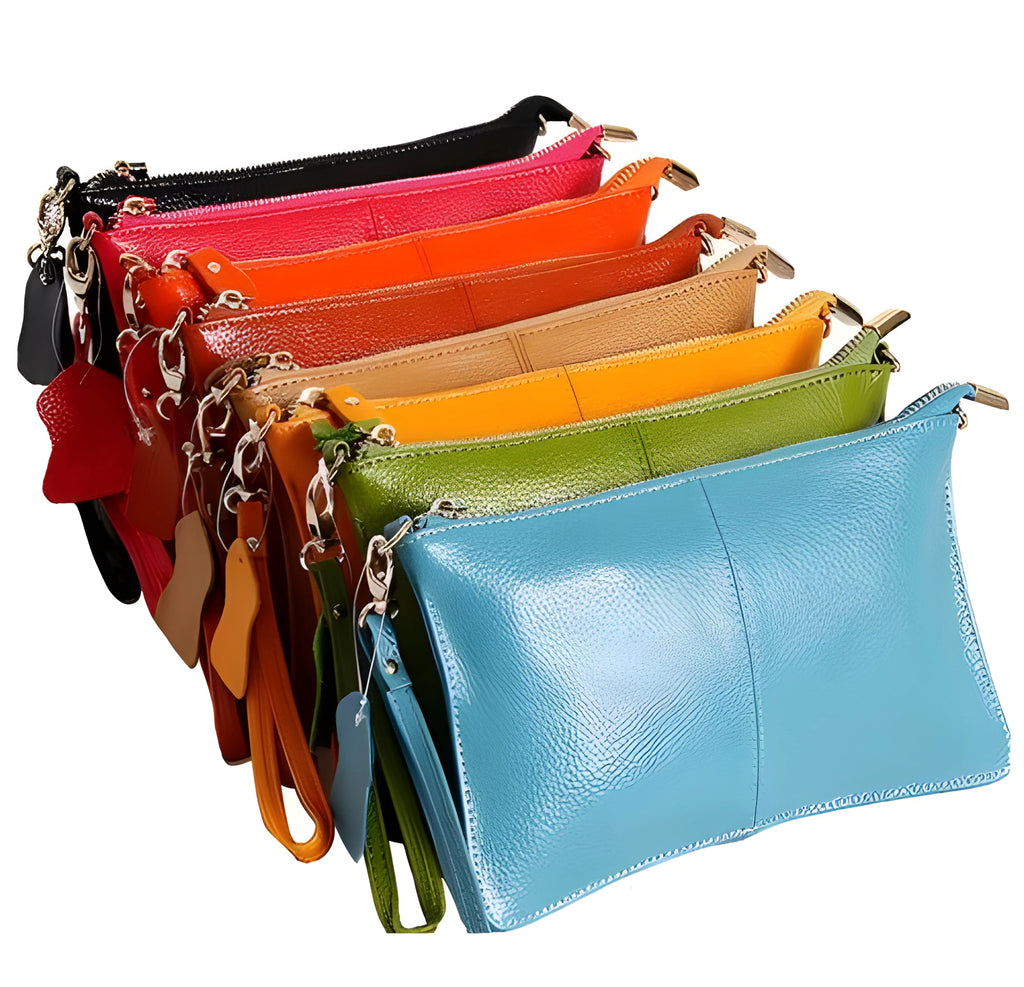 Lady cowhide slant bag showing hand strap and shoulder strap options with organised internal compartments