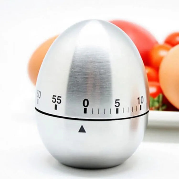 Stainless steel mechanical kitchen timer with egg shape measuring 7cm high