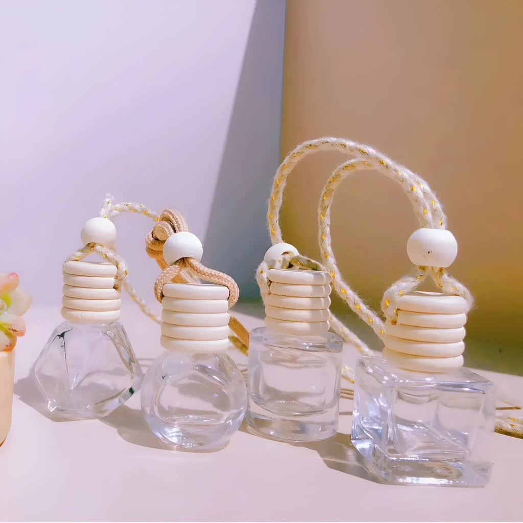 Car perfume pendant in glass with four style options for vehicle air freshening