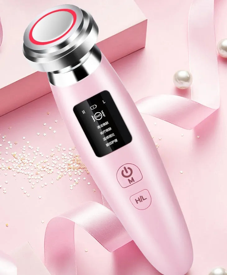 Pink handheld facial cleansing and rejuvenation beauty instrument showing 185mm length