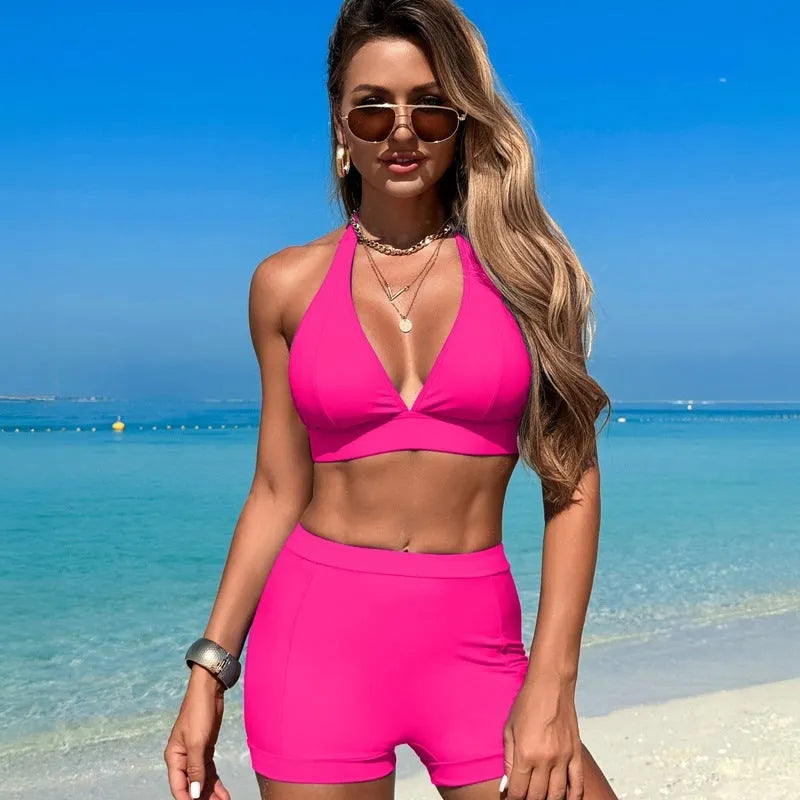 Women's split bikini swimsuit in black colour showing sleeveless design