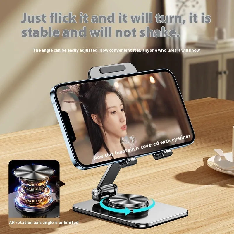 Rotatable folding mobile desktop stand phone holder in black on a desk showing adjustable angle
