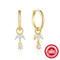 A pair of geometric sunflower design earrings in sterling silver with golden zircon stones, showcasing Mori fairy style.