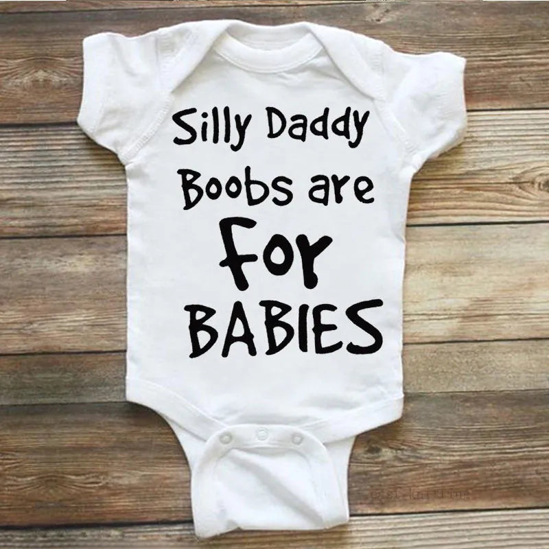 White unisex triangle climbing vest with Silly Daddy Boobs Are For Babies wording, polyester cotton, sizes S to 3XL
