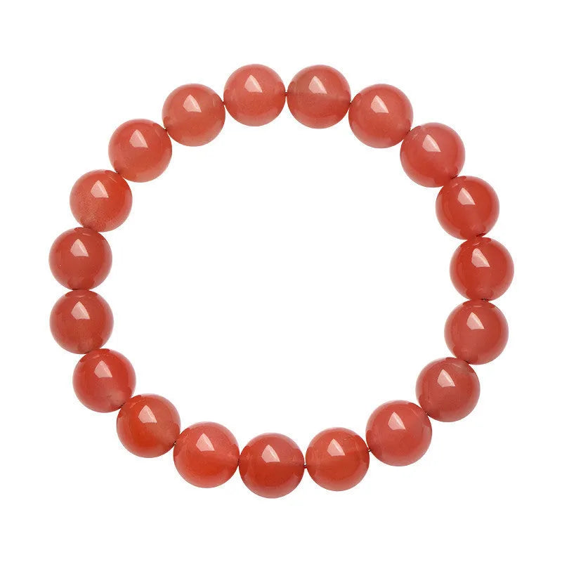 Natural cherry red agate beaded bracelet with polished round stones on a string.
