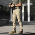 Loose multi-pocket durable men's cargo pants in cotton blend, khaki colour, plain pattern