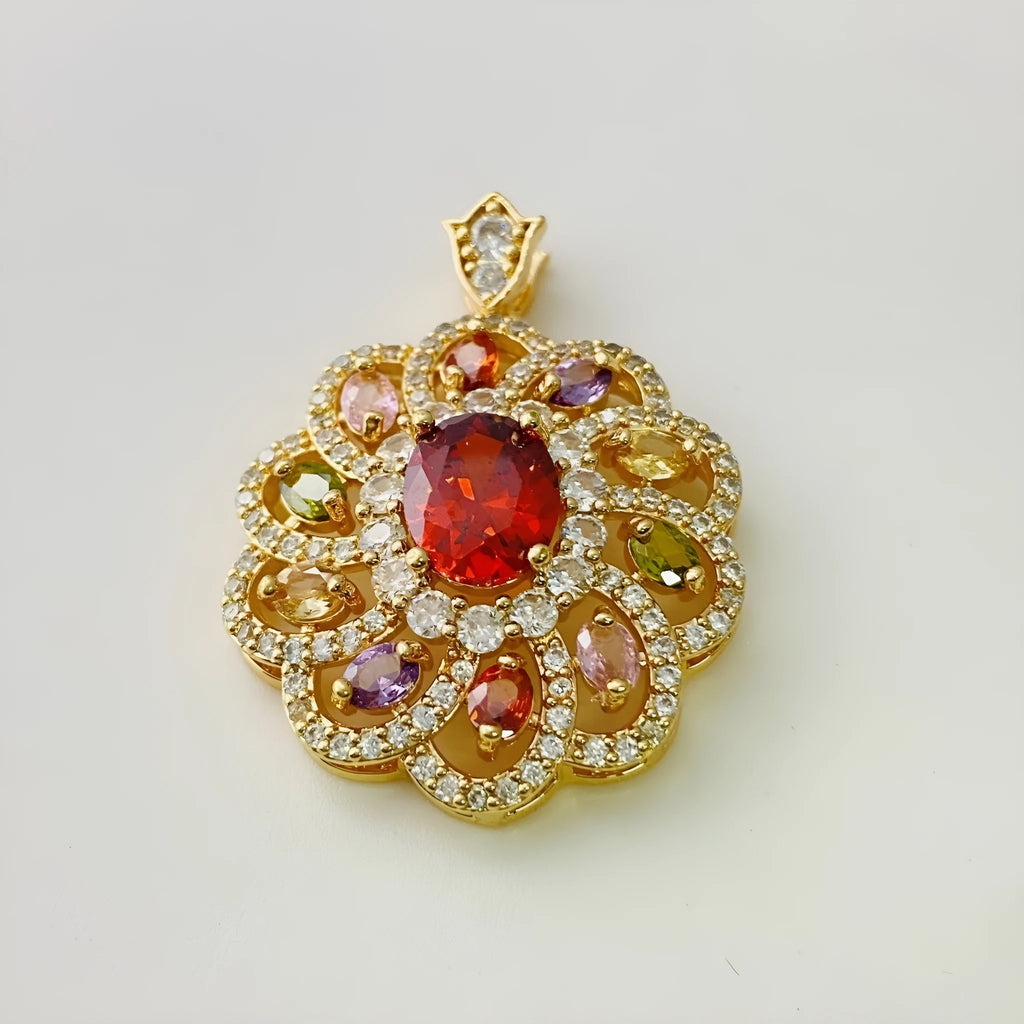 Close-up of a colourful zircon flower pendant necklace in a gold finish, showing floral detail.