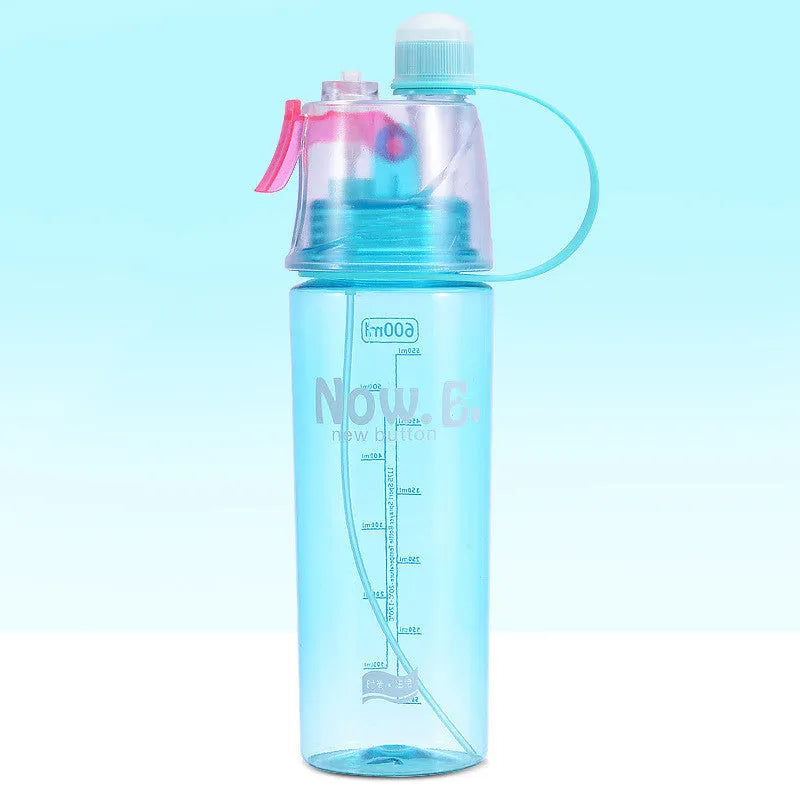 Portable mist spray sports water bottle with transparent body, handle, and press-to-spray mouth
