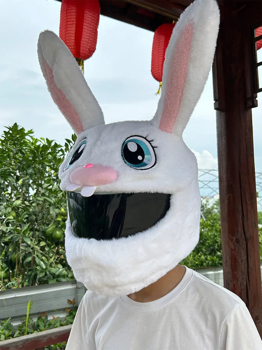 White plush rabbit head cover with long ears designed for an electric motorcycle helmet.