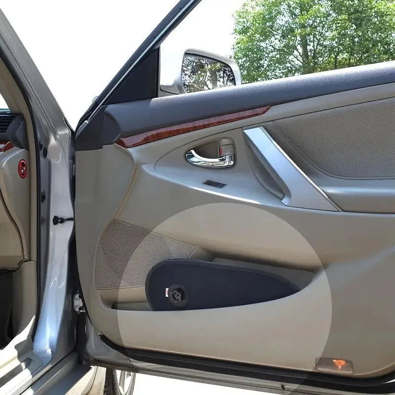 Black breathable car window shades with suction cups stretched across vehicle side window
