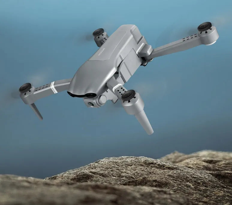 Grey folding GPS drone with 4K HD camera and 1080P bottom lens, folded size 18.5x12.5x6cm, model F3