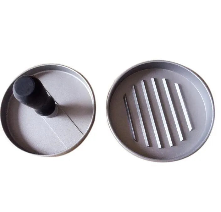 Single burger press in aluminium die casting, 12 x 12 x 9 cm, with base and handled press plate for meatloaf and barbecue use