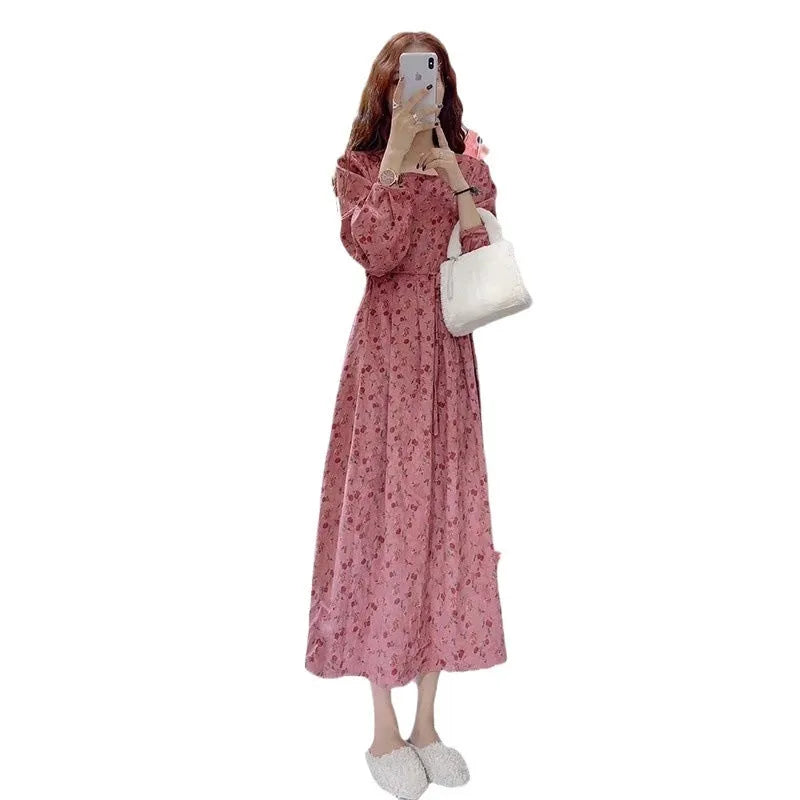 Red knitted cotton floral dress with princess sleeves and an elastic high waist.