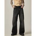 Black loose straight retro jeans with zipper fly on size chart background