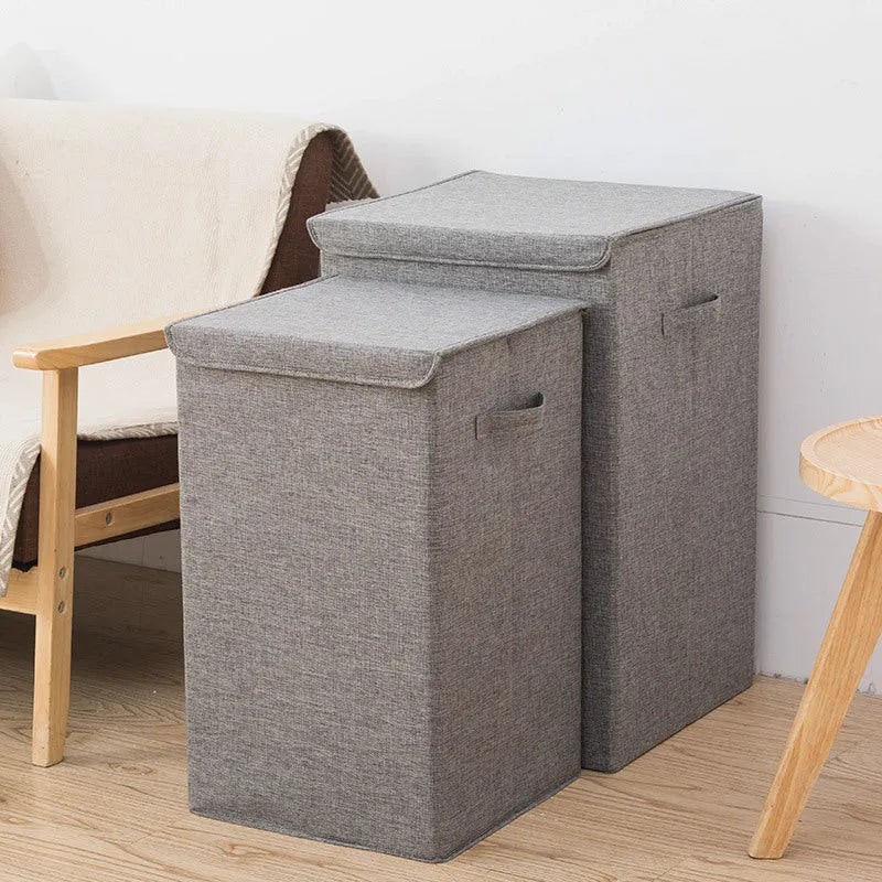 Foldable cotton linen storage basket in grey colour showing three-dimensional shape.