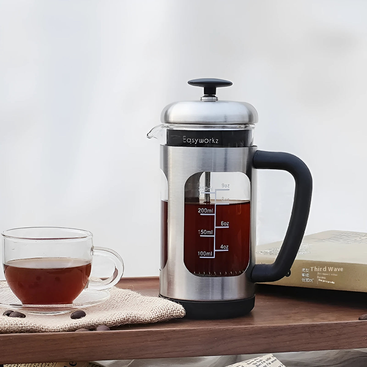 1000ml glass French press coffee maker with brewing filter and tea infuser, shown in black or light gray.