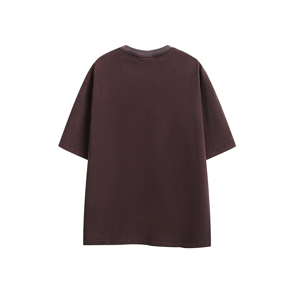 Men's loose-fit black embroidered retro short-sleeved cotton T-shirt on a hanger.