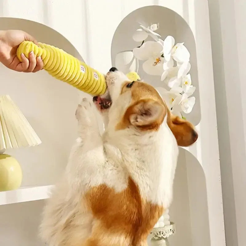 Yellow palm-shaped squeaky plush dog teething toy with bite-resistant fabric for puppy chewing relief