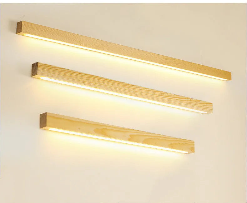 Walnut-coloured minimalist log strip wall lamp with wood and acrylic construction in three length options