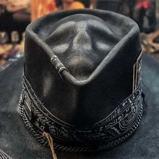 Handmade wool skull hat with a conical crown, shown in its specified colour, laid flat.
