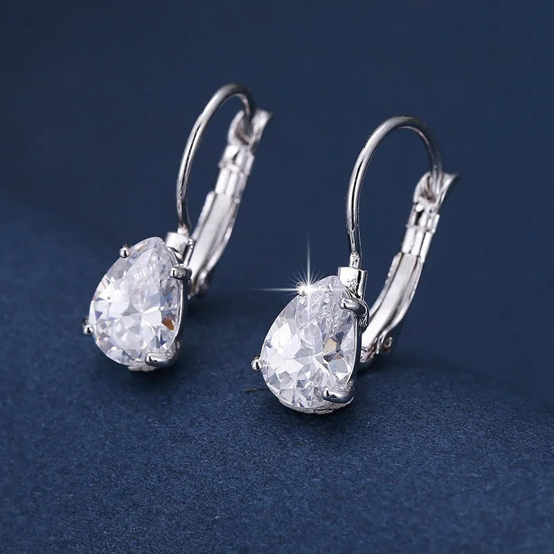 Copper drop-shaped earrings with platinum inlaid gemstone in gold and platinum colour options
