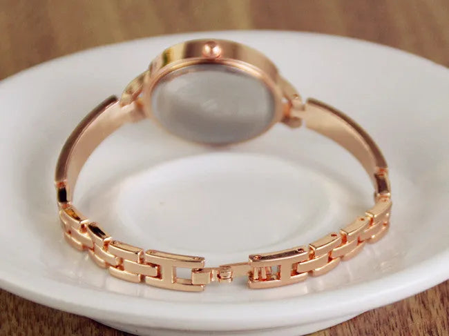 Rhinestone vintage watch bracelet with round dial, metal case, and alloy strap in gold or silver
