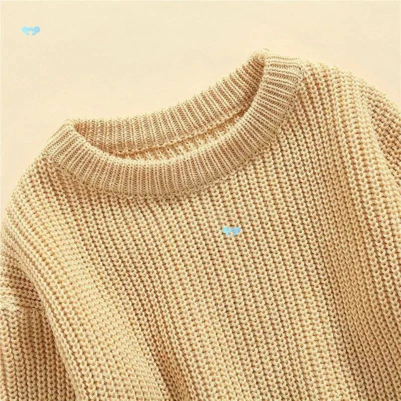 Girls' solid colour crew neck casual sweater in rabbit fur with star pattern, beige option, shown on child