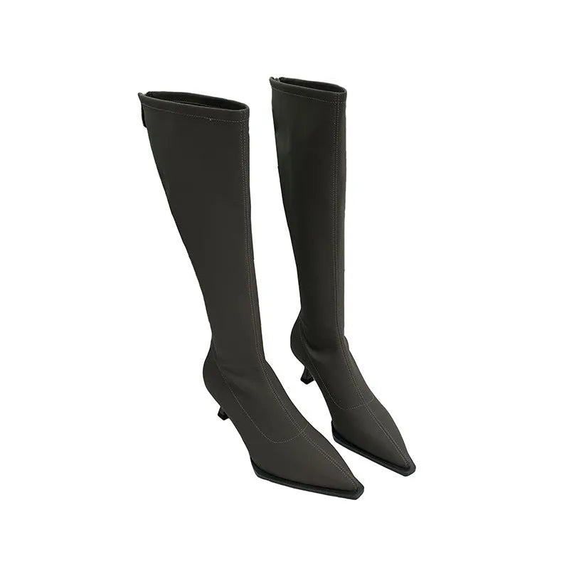 Black women's below-the-knee boots with pointed toe, stiletto heel, and a back zipper.