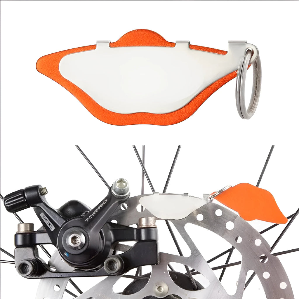 Mountain bike brake linings in black and orange colours with metal construction
