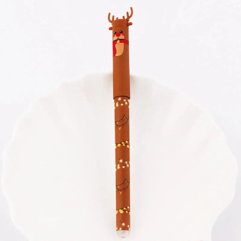 Four Christmas-themed erasable gel pens with Santa, gingerbread man, elk, and snowman designs on a white background