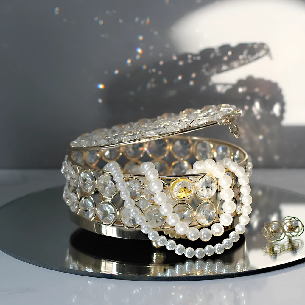 French gold European style jewelry box with crystal glass transparent lid showing contents