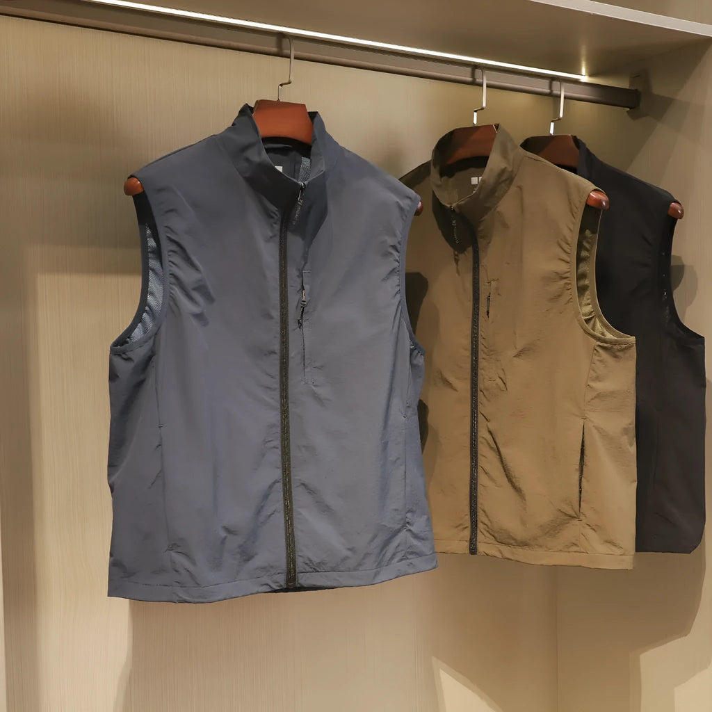 Men's straight cut thin nylon vest cardigan in army green with side seam pockets.
