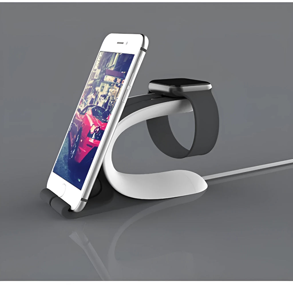 Grey Apple Watch and iPhone charging stand on a wooden desktop