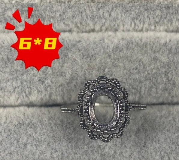 Oval denier copper ring with 6x8mm stone, star detail, and open-mouth band in Korean style.
