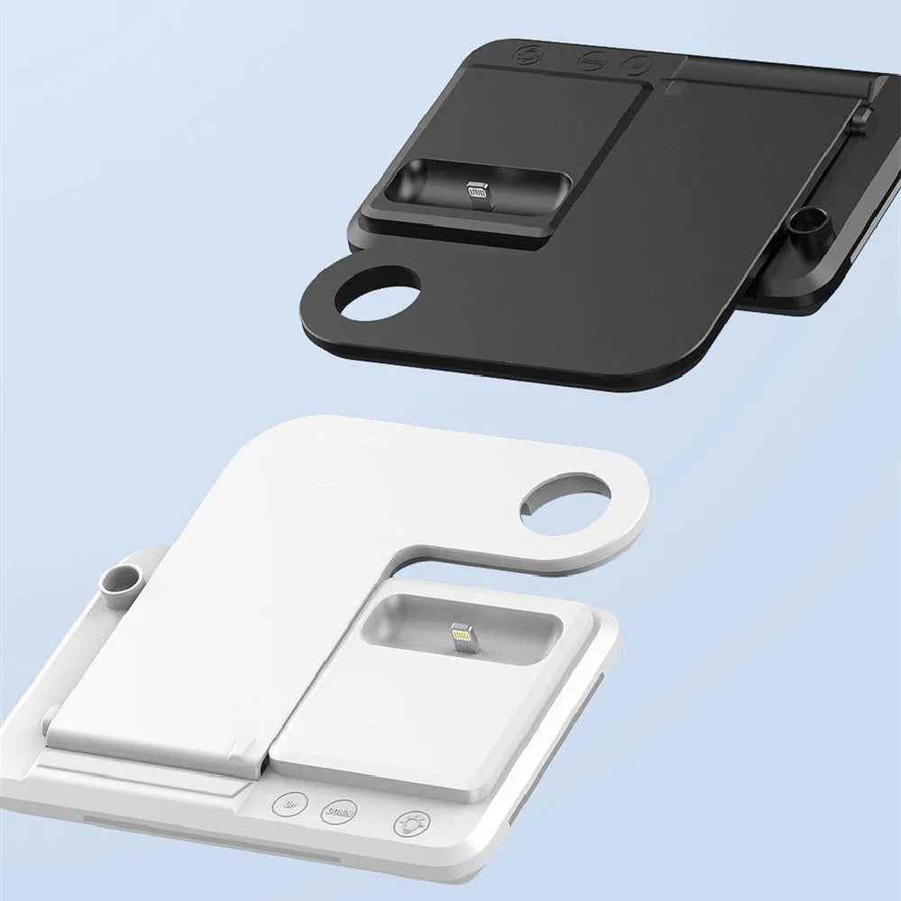 4-in-1 wireless charger stand Y1 in white holding a mobile phone, headset, watch, and Apple Pencil on a desktop