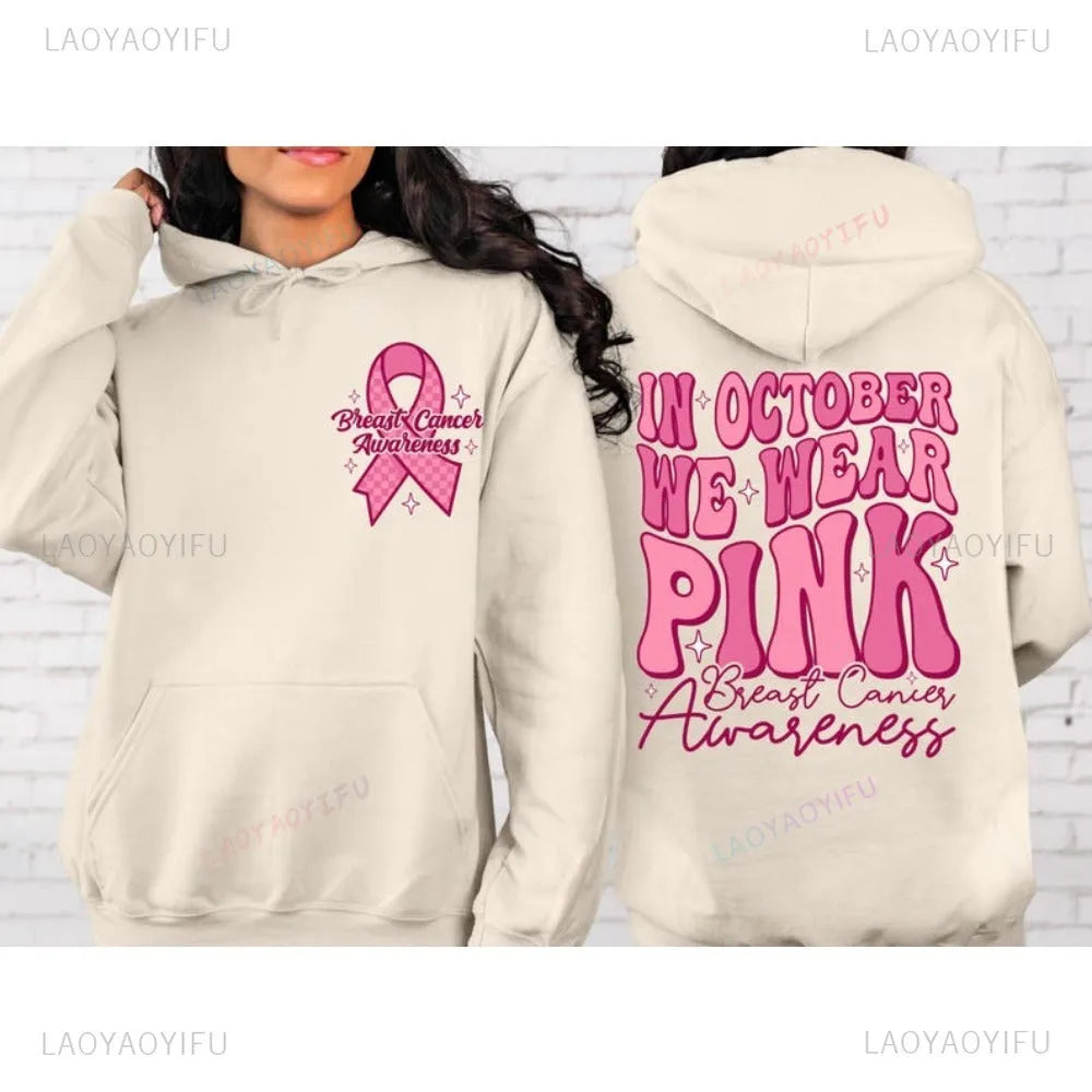 Pink women's hoodie with retro breast cancer awareness hot stamp design and side seam pocket.