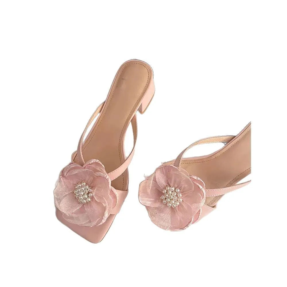 Women's cream chunky heel sandals with a square toe and a single satin strap.