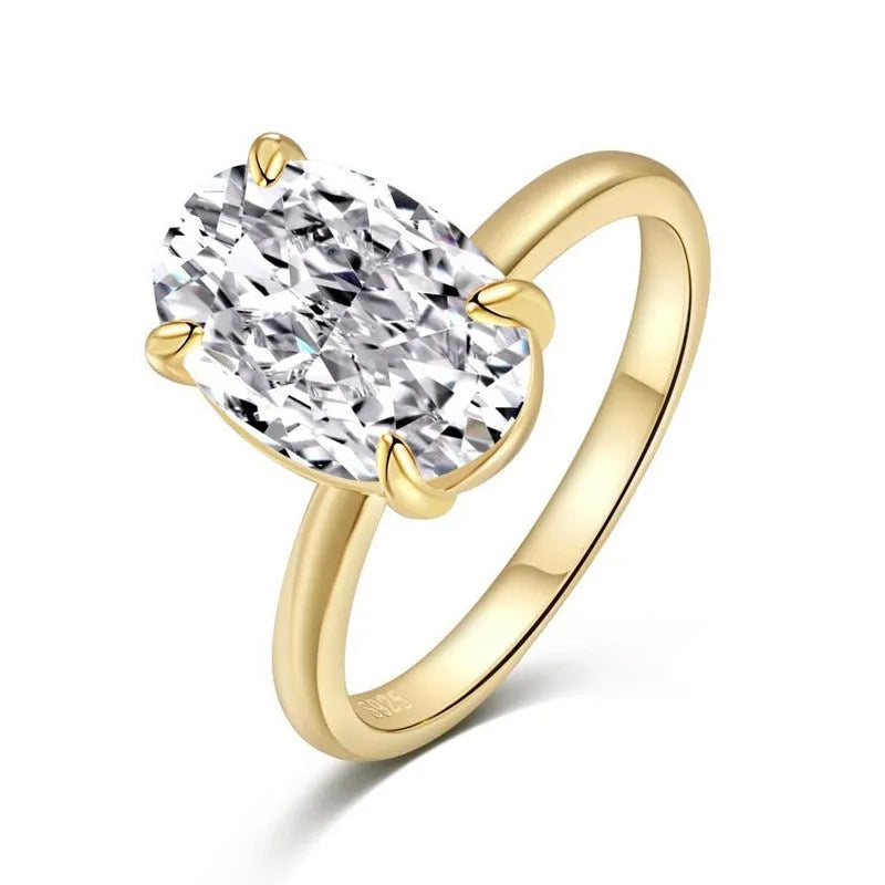 Oval cut solitaire ring in sterling silver with four-claw setting.