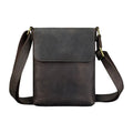 Men's brown Crazy Horse leather crossbody backpack on a plain background, showing retro design and iPad pocket