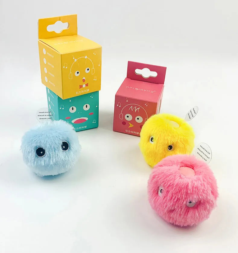Glowing plush cat toy ball with catnip in blue frog design on white background