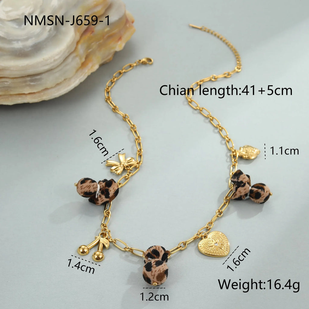 Geometric leopard pendant necklace with love heart and flower engravings on gold-plated chain