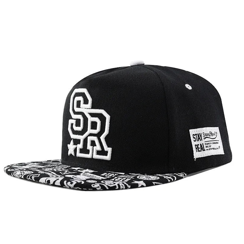 Cotton baseball cap with embroidered letters in black and white colour options