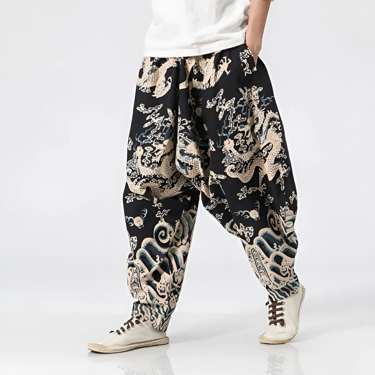 Men's hip hop cross pants with dragon print pattern and elastic waist in loose harem style.