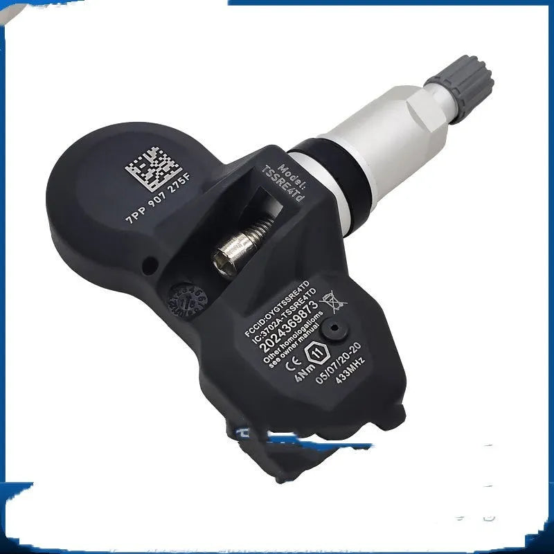 Audi car tyre pressure monitoring system TPMS replacement sensor with black valve cap.