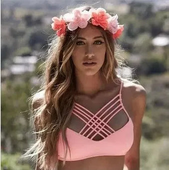 Women's pink cut out halter bikini swimsuit with bandage design and cross front details