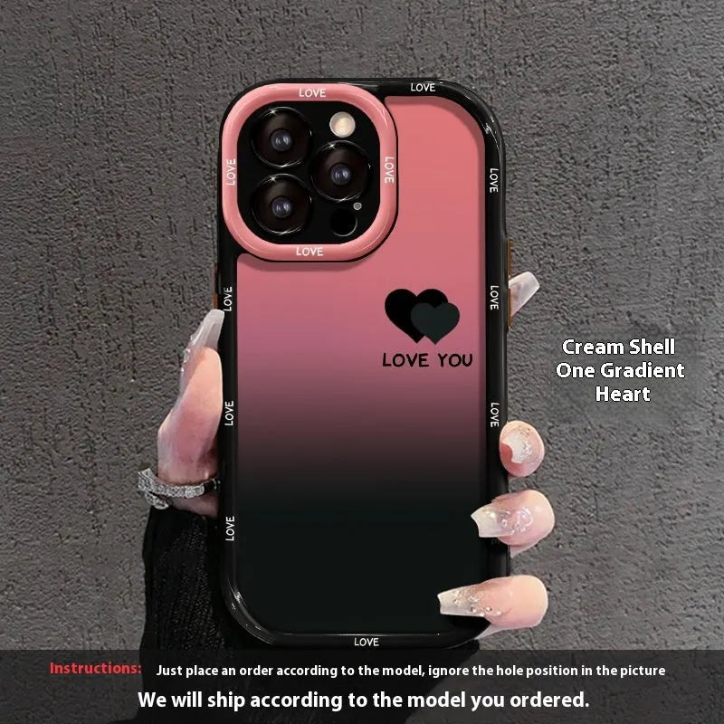 Cream coloured acrylic phone case with black gradient love heart design, showing fine-hole cut-outs for ports.