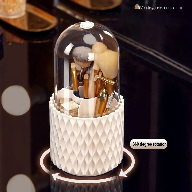 White rotating makeup brush storage box with transparent dust-proof cover on desktop