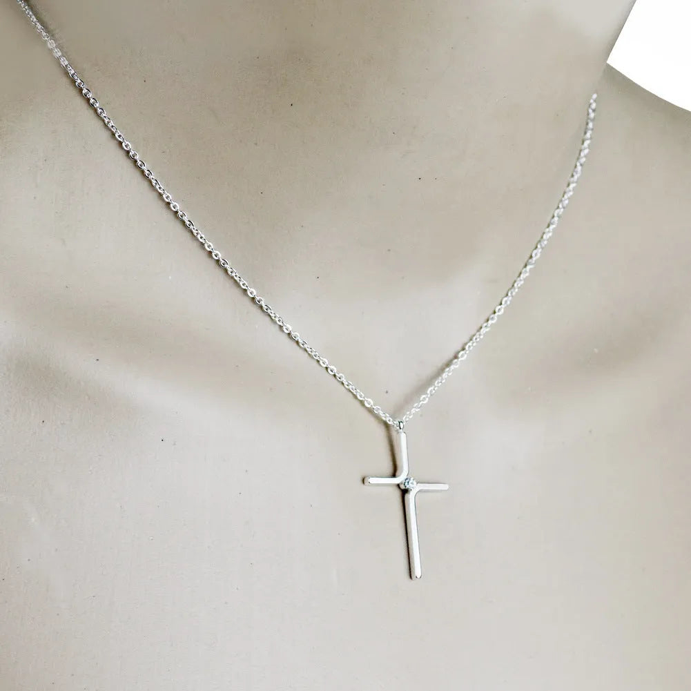 Titanium steel cross pendant necklace with inlaid gold finish and water wave chain, silver colour option